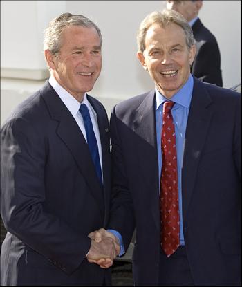 The Hague: Say the Word and We’ll Prosecute Bush and Blair