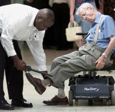 Bush Restricts Travel Rights of More Than 100,000